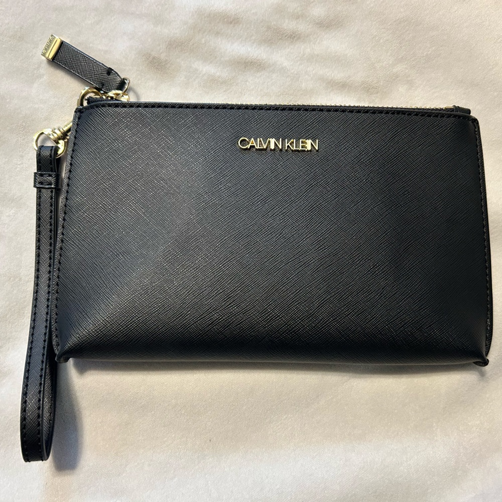 Calvin Klein Black Leather Wristlet clutch with Gold-Tone Hardware